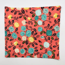 Load image into Gallery viewer, Image of green, yellow and white flowers on an orange background cotton print.