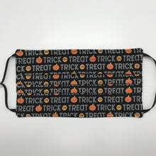 Load image into Gallery viewer, Masks are made of 2 layers 100% quilting cotton featuring a print of trick or treat words and pumpkins on black, adjustable elastic ear loops and a bendable aluminum nose. Wash in washing machine and dry in dryer after each use. 7” H x 7.5” W