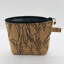 Load image into Gallery viewer, The pouch is made from Roasted Pecan Essex linen/cotton from the Driftless collection by Anna Graham for Robert Kaufman Fabrics and a layer of fleece. The cute metal tassel gives an added touch. 6”W x 4.5” H x 1”D. Machine washable and dryer safe, or air dry.