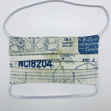 Load image into Gallery viewer, Masks are made of 2 layers 100% quilting cotton featuring a blue and white novelty airplane themed print, behind the head elastic band and a bendable aluminum nose. Wash in washing machine and dry in dryer after each use. 7” H x 7.5” W