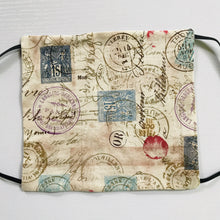 Load image into Gallery viewer, 100% quilting-weight 100% cotton face mask with elastic bands and bendable nose piece. The novelty, tan print give the mask an antique feel. Wash in washing machine and dry in dryer after each use. Collection: Correspondence - Stamps and Postmarks Fabric, Eclectic Elements by Tim Holtz 7” H x 7.5” W