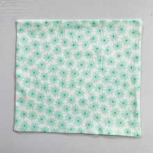 Load image into Gallery viewer, Image of aqua flowers on white cotton print