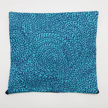 Load image into Gallery viewer, Image of black swirl vines on blue cotton print.
