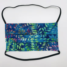 Load image into Gallery viewer, Masks are made of 2 layers of 100% quilting cotton of blue, green and purple leaves and have over the head elastic loops. The masks also have a bendable aluminum nose piece. Wash in washing machine and dry in dryer after each use. 7” H x 7.5” W
