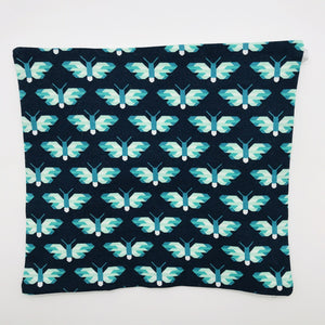 Image of green and white butterflies on navy print.