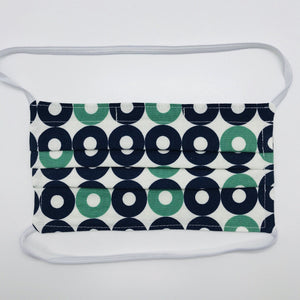 Masks are made of 2 layers of 100% quilting-weight blue, green and white record shapes cotton print, behind the head elastic bands and a bendable aluminum nose piece Wash in washing machine and dry in dryer after each use. 7” H x 7.5” W