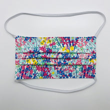 Load image into Gallery viewer, Masks are made of 2 layers of spring flowers print 100% quilting cotton and have behind the head elastic bands. The masks also have a bendable aluminum nose. Wash in washing machine and dry in dryer after each use. 7” H x 7.5” W
