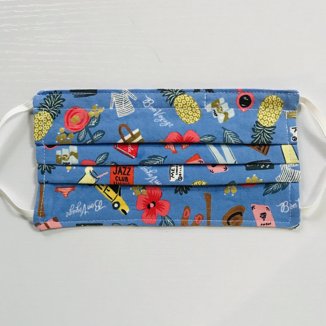 This mask is crafted with two layers of 100% quilting-weight cotton fabric with a blue travel theme and is machine washable and dryable. The adjustable ear loops are made of elastic and tightened with a  bead to make them comfortable to fit a wider range of sizes. The masks also have a bendable aluminum nose piece.  7” H x 7.5” W