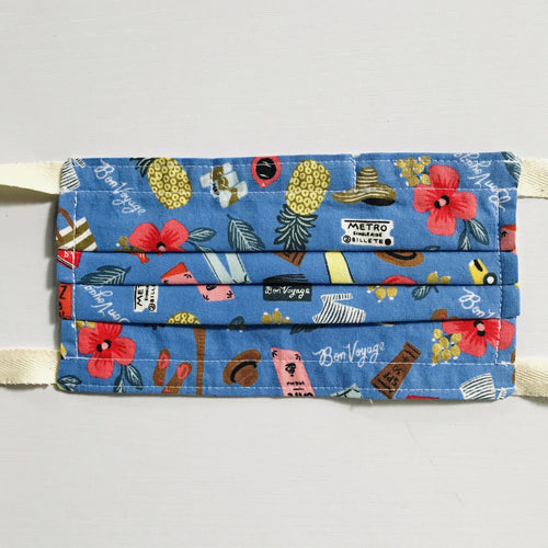 100% quilting-weight blue, travel themed cotton face mask with twill tape straps and bendable nose piece. Washable, reusable fabric face mask. Wash in washing machine and dry in dryer after each use.  Fabric from the Les Fleurs collection by Rifle Paper co, designed by Ann Rifle Bond.  7” H x 7.5” W