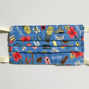 100% quilting-weight blue, travel themed cotton face mask with twill tape straps and bendable nose piece. Washable, reusable fabric face mask. Wash in washing machine and dry in dryer after each use.  Fabric from the Les Fleurs collection by Rifle Paper co, designed by Ann Rifle Bond.  7” H x 7.5” W