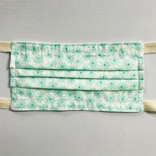 Load image into Gallery viewer, 100% quilting-weight aqua green cotton face mask with twill tape straps and bendable nose piece. Washable, reusable fabric face mask. Wash in washing machine and dry in dryer after each use.  Fabric from the Pond collection by Elizabeth Hartman  7” H x 7.5” W
