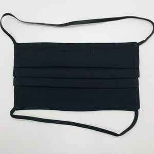 The masks are made of three layers of 100% quilting-weigh cotton fabric with a solid black front piece. This mask includes a filter pocket located in the pleats in the back of the mask for a filter of your choice and has elastic head bands and a bendable aluminum nose piece. Machine wash and dry after each use. 7” H x 7.5” W