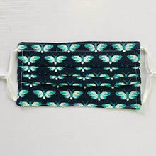 Load image into Gallery viewer, 100% quilting-weight blue and green animal themed cotton face mask with adjustable elastic ear loops and bendable nose piece. Washable, reusable fabric face mask. Wash in washing machine and dry in dryer after each use. 7” H x 7.5” W  Butterflies in Ultra Marine - Pacific Collection - Elizabeth Hartman (designer)-Robert Kaufman Fabrics
