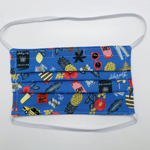 Made with three layers of blue travel themed print 100% quilting cotton, this mask includes a filter pocket located in the pleats in the back of the mask for a filter of your choice, elastic head bands and a bendable aluminum nose. Machine wash and dry after each use. 7” H x 7.5” W
