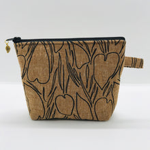 Load image into Gallery viewer, The pouch is made from Roasted Pecan Essex linen/cotton from the Driftless collection by Anna Graham for Robert Kaufman Fabrics and a layer of fleece. The cute metal tassel gives an added touch. 6”W x 4.5” H x 1”D. Machine washable and dryer safe, or air dry.
