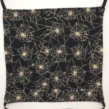 Load image into Gallery viewer, Image of spider webs on black cotton print.
