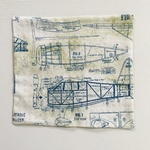 Image of blue and white novelty airplane themed cotton print.