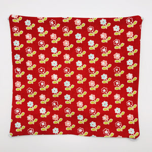 Image of Vintage Picnic Flowers on red fabric. 