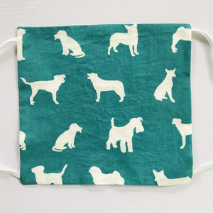 White Dogs on a Green Face Mask with Adjustable Elastic Ear Loops