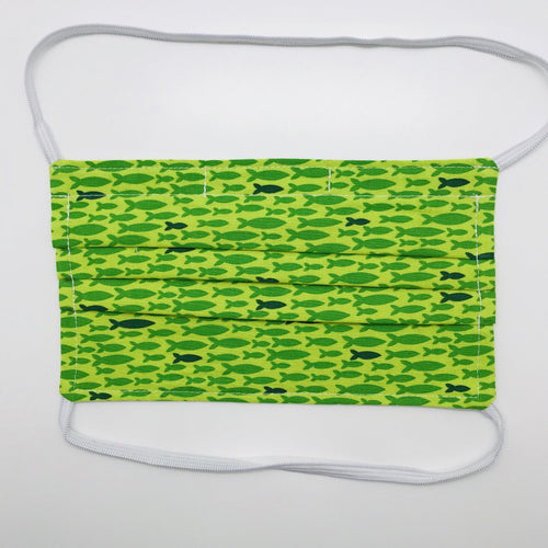 Masks are made of 2 layers 100% quilting cotton featuring a print of lime green fish in a row, over the head elastic loops and a bendable aluminum nose. Wash in washing machine and dry in dryer after each use. 7” H x 7.5” W 