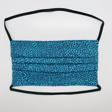 Load image into Gallery viewer, Masks are made of 2 layers 100% quilting cotton featuring a black vines on blue print, over the head elastic loops and a bendable aluminum nose. Wash in washing machine and dry in dryer after each use. 7” H x 7.5” W 
