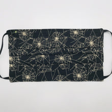 Load image into Gallery viewer, Masks are made of 2 layers 100% quilting cotton featuring a print of spider webs on black, adjustable elastic ear loops and a bendable aluminum nose. Wash in washing machine and dry in dryer after each use. 7” H x 7.5” W
